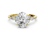 Yellow gold Oval Cut Brilliant Diamond Solitaire Ring with Pear Side Stones and Four-Prong Setting_3