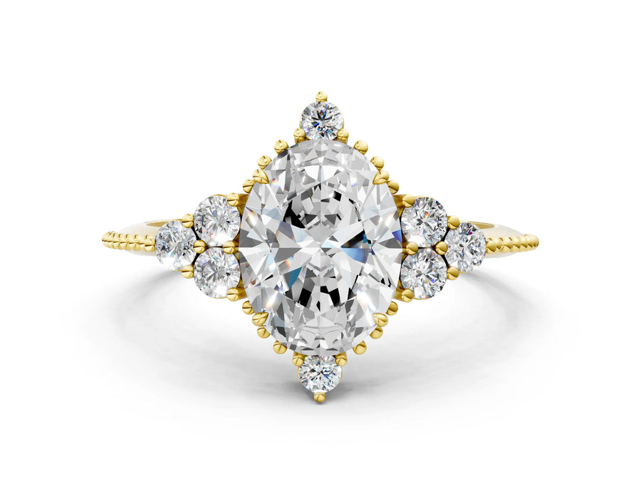 Yellow gold Oval Cut Brilliant Diamond with Cluster Setting on a Beaded Band and Four-Prong Setting