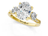 Yellow gold Oval Cut Brilliant Three-Stone Diamond Ring with Pavé Band and Four-Prong Setting_4