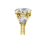 Yellow gold Oval Cut Brilliant Three-Stone Diamond Ring with Pavé Band and Four-Prong Setting_8
