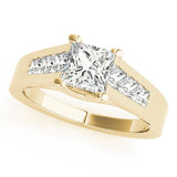 Yellow gold Oval Cut Channel Set Solitaire Ring with Four-Prong Setting
