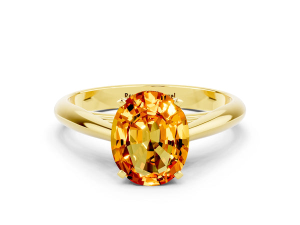 Yellow gold Oval Cut Citrine Solitaire Engagement Ring with Cathedral Setting and Four-Prong Mount