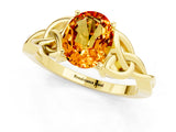 Yellow gold Oval Cut Citrine Solitaire Engagement Ring with Celtic Knot Band and Four-Prong Setting_1