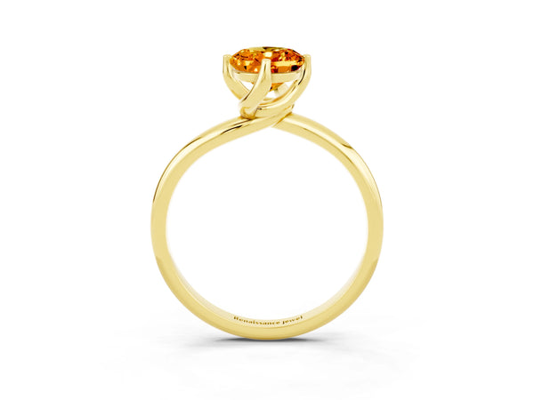 Yellow gold Oval Cut Citrine Solitaire Engagement Ring with Four-Prong Setting and Classic Band