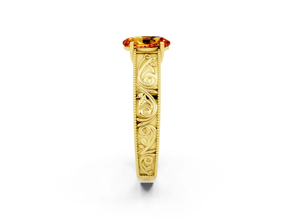 Yellow gold Oval Cut Citrine Solitaire Ring with Engraved Band and Four-Prong Setting