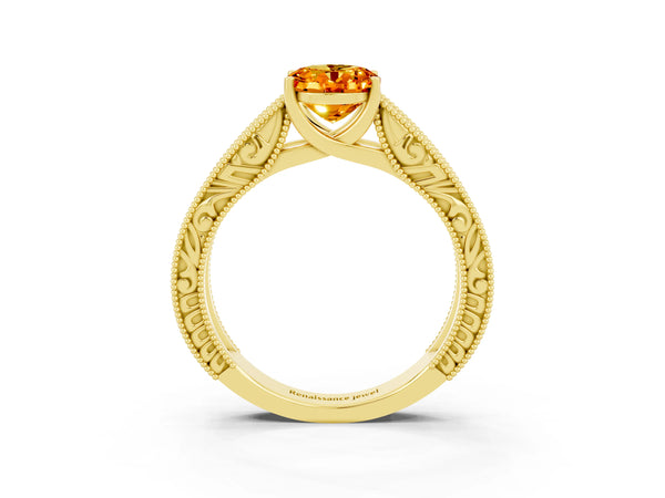 Yellow gold Oval Cut Citrine Solitaire Ring with Engraved Band and Four-Prong Setting