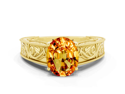 Yellow gold Oval Cut Citrine Solitaire Ring with Engraved Band and Four-Prong Setting