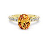 Yellow gold Oval Cut Citrine Solitaire Ring with Pavé Accents and Four-Prong Setting