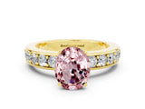 Yellow gold Oval Cut Cut Channel Set Diamond Engagement Ring with Four-Prong Setting