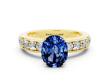 Yellow gold Oval Cut Cut Channel Set Diamond Engagement Ring with Four-Prong Setting