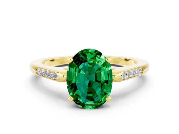 Yellow gold Oval Cut Emerald Solitaire Ring with Channel Set Round Band and Prong Setting