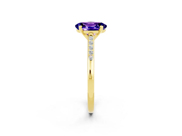 Yellow gold Oval Cut Tanzanite Solitaire Ring with Channel Set Round Band and Prong Setting
