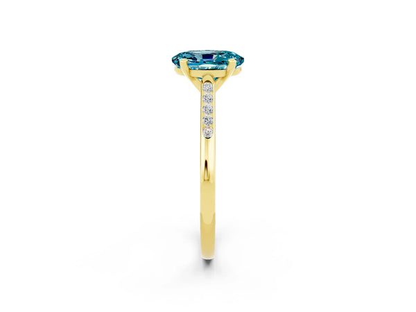 Yellow gold Oval Cut Blue Topaz Solitaire Ring with Channel Set Round Band and Prong Setting
