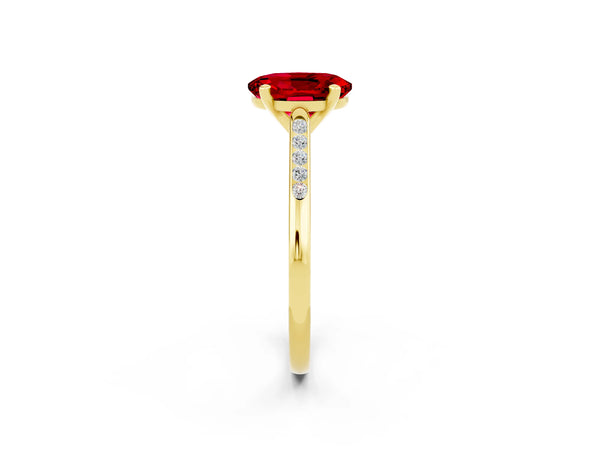 Yellow gold Oval Cut Ruby Solitaire Ring with Channel Set Round Band and Prong Setting