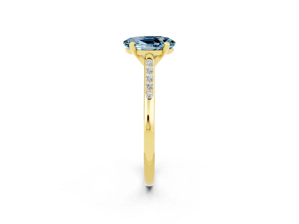 Yellow gold Oval Cut Aquamarine Solitaire Ring with Channel Set Round Band and Prong Setting