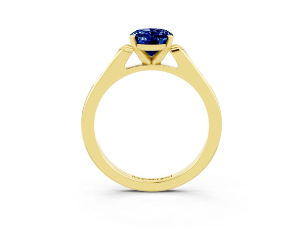Yellow gold Oval Cut Blue Sapphire Solitaire Ring with Channel Set Round Band and Prong Setting