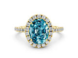 Yellow gold Oval Cut Cut Diamond Floral Halo Engagement Ring with Pavé Band and Prong Setting