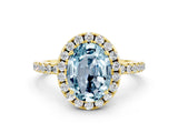 Yellow gold Oval Cut Cut Diamond Floral Halo Engagement Ring with Pavé Band and Prong Setting