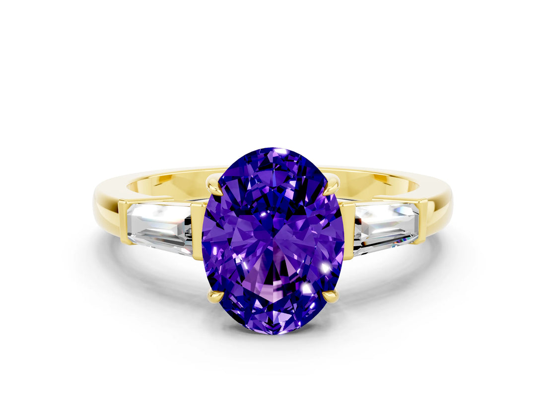 Yellow gold Oval Cut Cut Diamond Ring with Tapered Baguette Side Stones in Four-Prong Setting