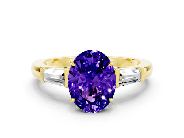 Yellow gold Oval Cut Tanzanite Three-Stone Ring with Tapered Baguette Side Stones and Prong Setting