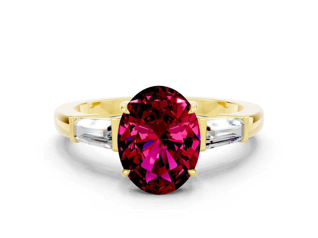 Yellow gold Oval Cut Cut Diamond Ring with Tapered Baguette Side Stones in Four-Prong Setting