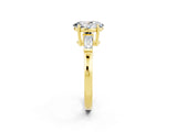 Yellow gold Oval Cut Cut Diamond Ring with Tapered Baguette Side Stones in Four-Prong Setting_2