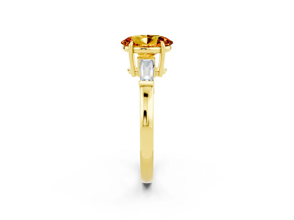 Yellow gold Oval Cut Citrine Three-Stone Ring with Tapered Baguette Side Stones and Prong Setting