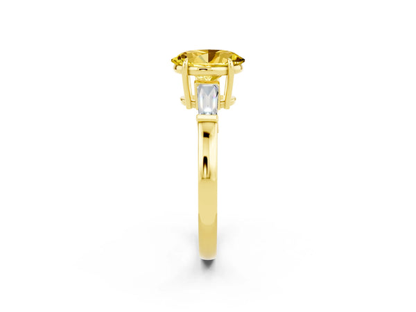 Yellow gold Oval Cut Yellow Sapphire Three-Stone Ring with Tapered Baguette Side Stones and Prong Setting