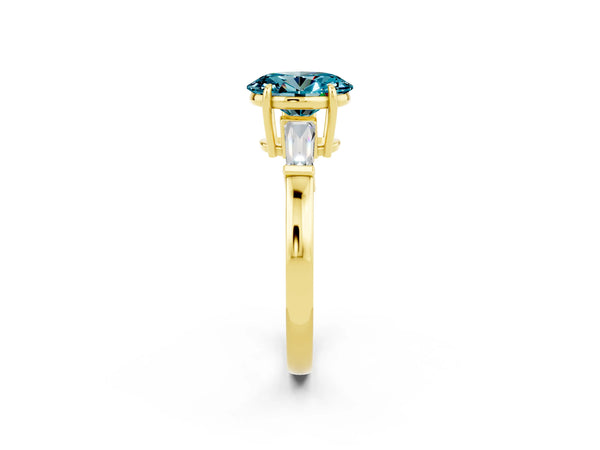 Yellow gold Oval Cut Cut Diamond Ring with Tapered Baguette Side Stones in Four-Prong Setting