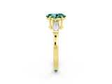 Yellow gold Oval Cut Cut Diamond Ring with Tapered Baguette Side Stones in Four-Prong Setting_2