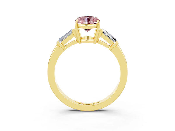 Yellow gold Oval Cut Cut Diamond Ring with Tapered Baguette Side Stones in Four-Prong Setting