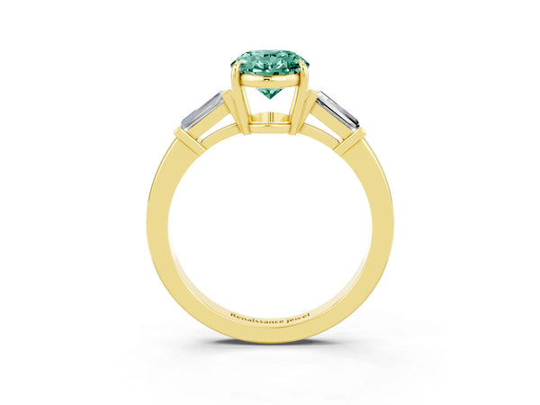 Yellow gold Oval Cut Green Sapphire Three-Stone Ring with Tapered Baguette Side Stones and Prong Setting