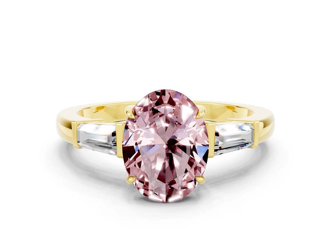 Yellow gold Oval Cut Cut Diamond Ring with Tapered Baguette Side Stones in Four-Prong Setting