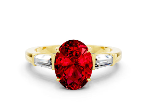 Yellow gold Oval Cut Cut Diamond Ring with Tapered Baguette Side Stones in Four-Prong Setting