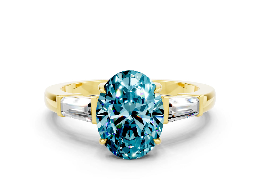 Yellow gold Oval Cut Cut Diamond Ring with Tapered Baguette Side Stones in Four-Prong Setting