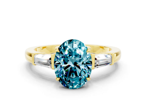 Yellow gold Oval Cut Cut Diamond Ring with Tapered Baguette Side Stones in Four-Prong Setting