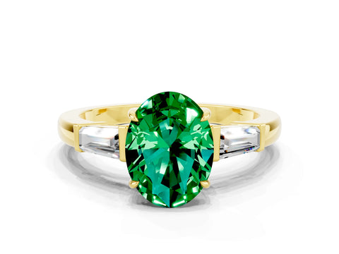 Yellow gold Oval Cut Cut Diamond Ring with Tapered Baguette Side Stones in Four-Prong Setting