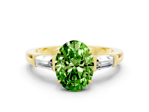 Yellow gold Oval Cut Cut Diamond Ring with Tapered Baguette Side Stones in Four-Prong Setting