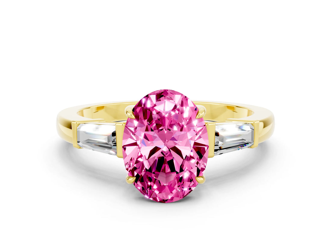 Yellow gold Oval Cut Cut Diamond Ring with Tapered Baguette Side Stones in Four-Prong Setting