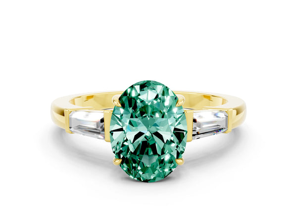 Yellow gold Oval Cut Green Sapphire Three-Stone Ring with Tapered Baguette Side Stones and Prong Setting
