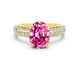 Yellow gold Oval Cut Cut Pave Diamond Engagement Ring with Channel Set Band and Four-Prong Setting