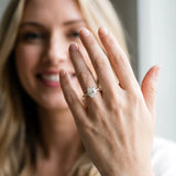 Yellow gold Oval Cut Diamond Brilliant Solitaire Ring with Pavé Band and Four-Prong Setting