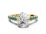 Yellow gold Oval Cut Diamond Cathedral Solitaire Ring with Round with Blue Topaz side stone Pavé Band