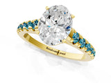 Yellow gold Oval Cut Diamond Cathedral Solitaire Ring with Round with Blue Topaz side stone Pavé Band_1