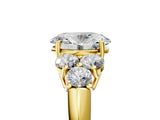 Yellow gold Oval Cut Diamond Cluster Ring with Round Accent Stones and Prong Setting on a Classic Band_62