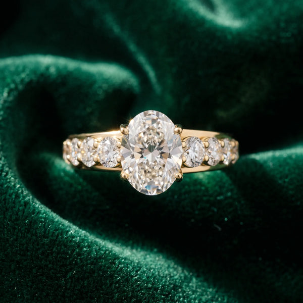 Yellow gold Oval Cut Diamond Engagement Ring with Pavé Band and Four-Prong Setting