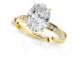 Yellow gold Oval Cut Diamond Engagement Ring with Side Stone Accents and Four-Prong Setting_62