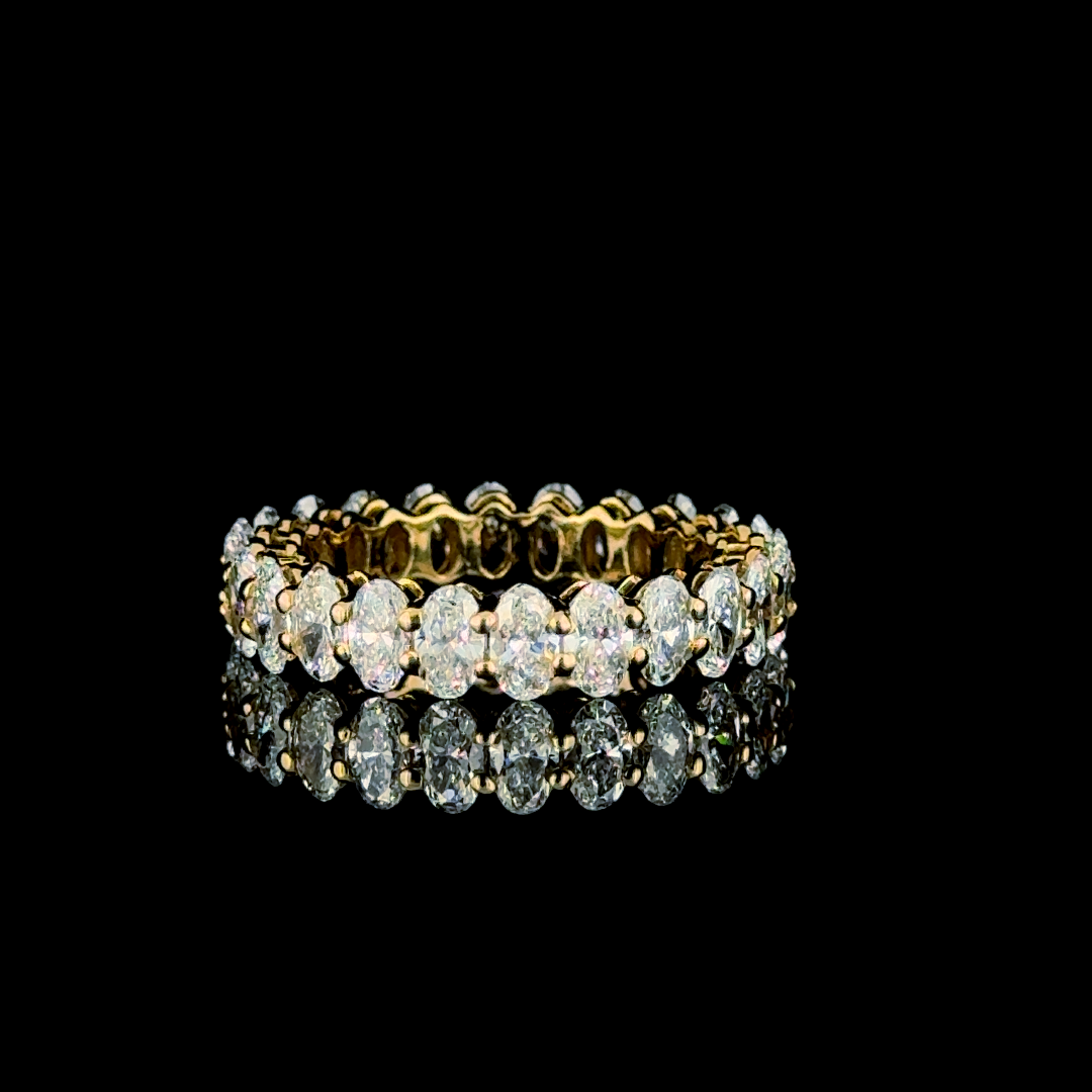 Yellow gold Oval Cut Diamond Eternity Band with Shared Prong Setting