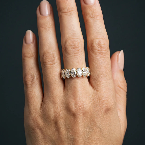 Yellow gold Oval Cut Diamond Eternity Band with Shared Prong Setting