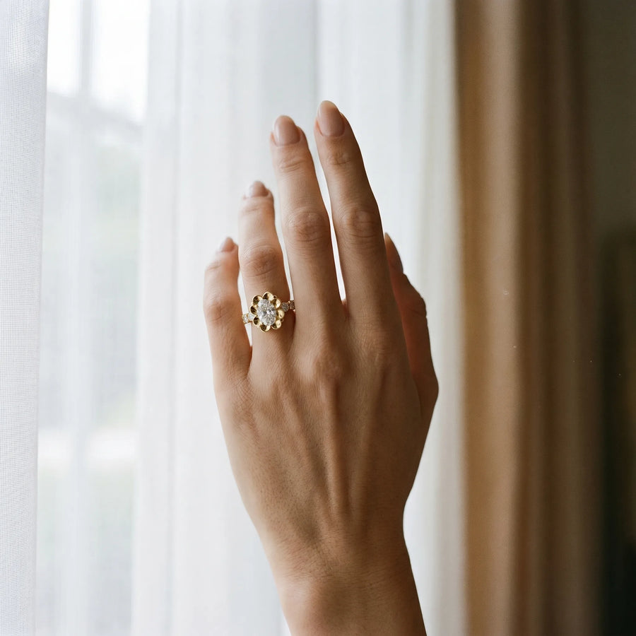 Yellow gold Oval Cut Diamond Floral Halo Engagement Ring with Shared Prong Setting